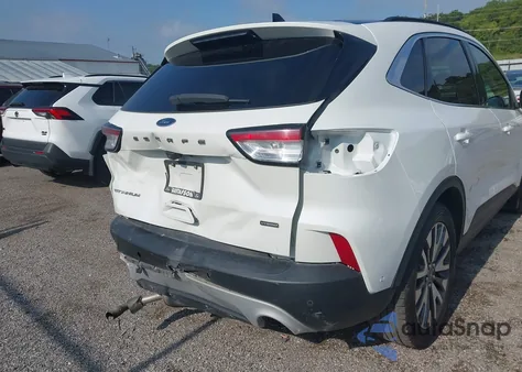 2020 Ford Escape Titanium Hybrid z USA, uszkodzony, nr VIN 1FMCU0DZ1LUA10524